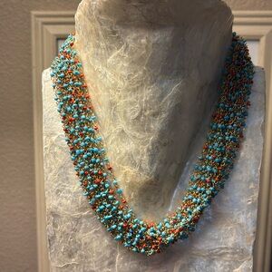 One of a kind beauty this beaded necklace is very lightweight and the colors